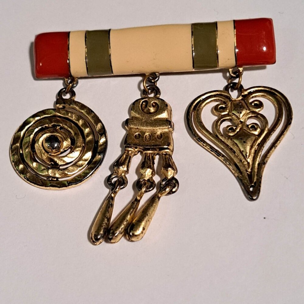 red green cream enamel bar brooch with dangling heart and spiral design